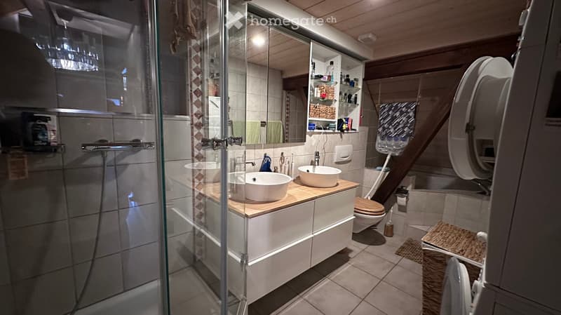 modern bathroom with shower, double sink, toilet, bathtub, wooden shelves, tiled floor