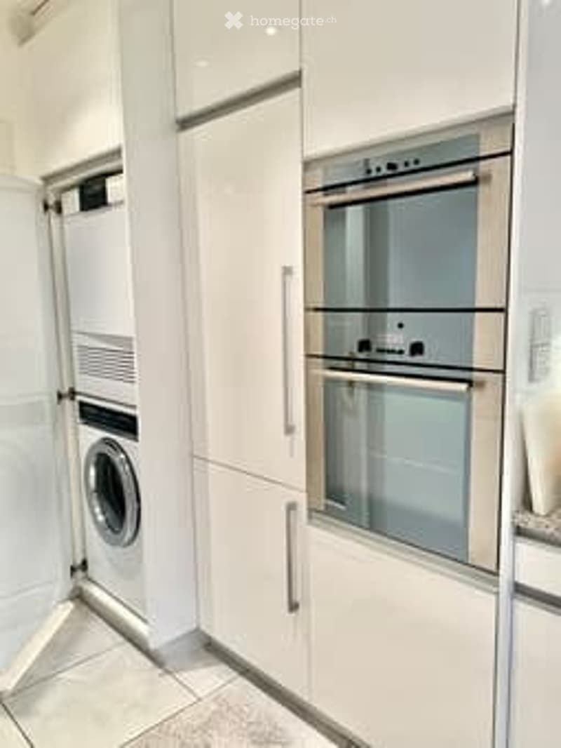 kitchen with washing machine, oven, and dishwasher