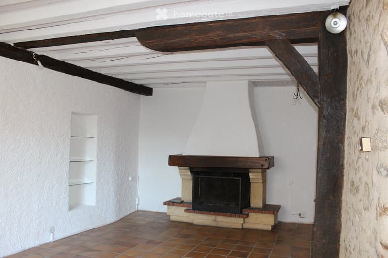 white walls, tiled floor, fireplace, wooden beams, built-in shelves