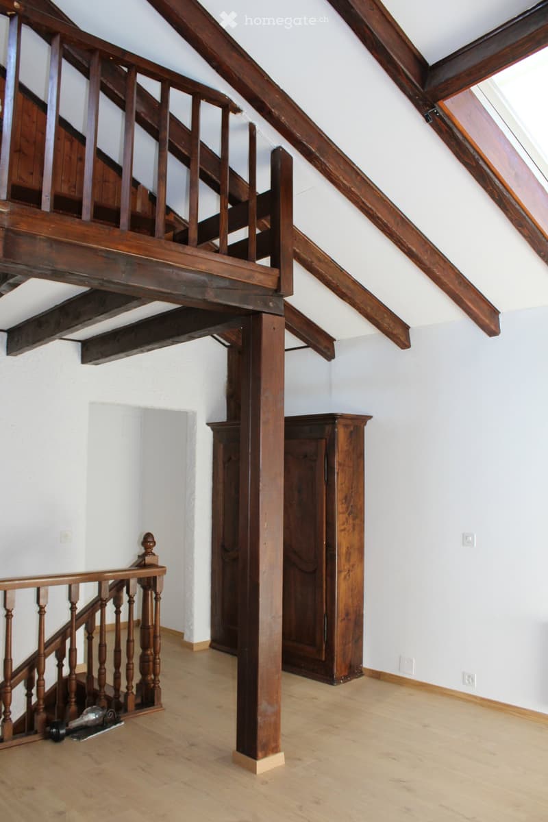 wooden beams, wooden floor, wooden cabinet, wooden staircase, white walls