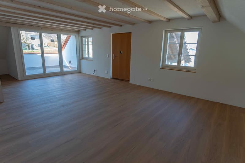 wooden floor, white walls, large glass door, windows