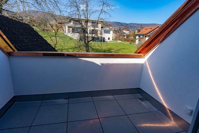 small balcony with tiled floor, overlooking neighborhood