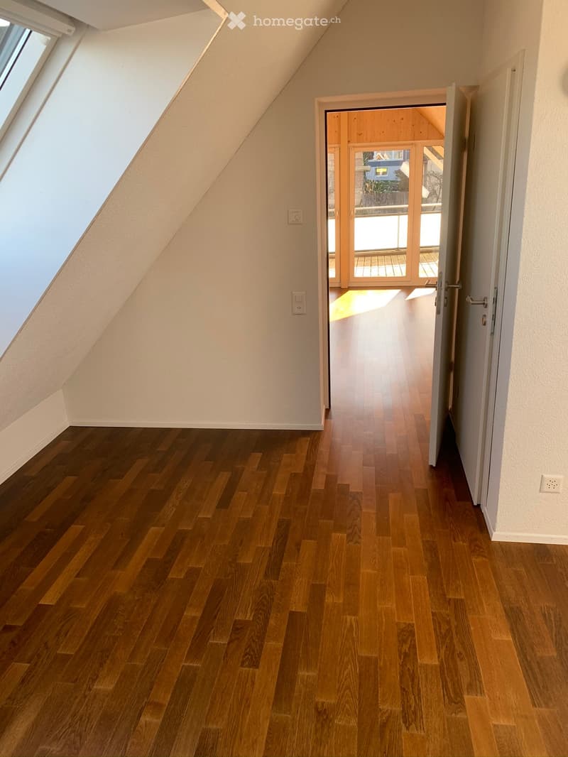 empty room, wooden floor, white walls, open door, balcony