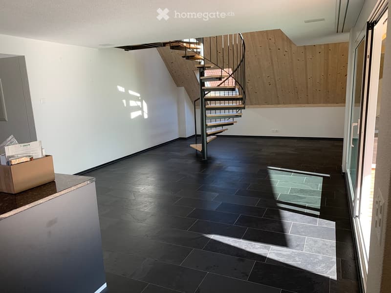 empty room, black tiled floor, spiral staircase, wooden wall, glass door
