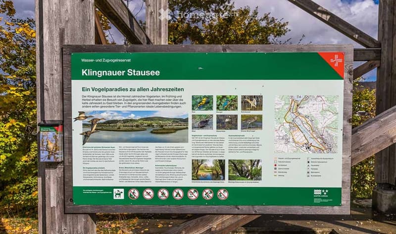 A signboard with information about the Klingnauer Stausee, a bird sanctuary.