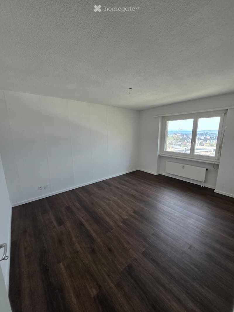 empty room, wooden floor, white walls, large window, city view