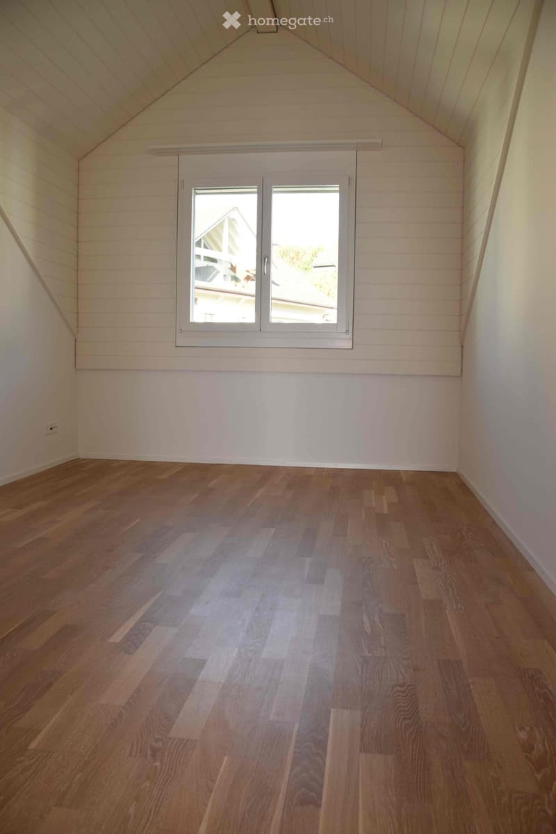 white walls, wooden floor, window, empty room