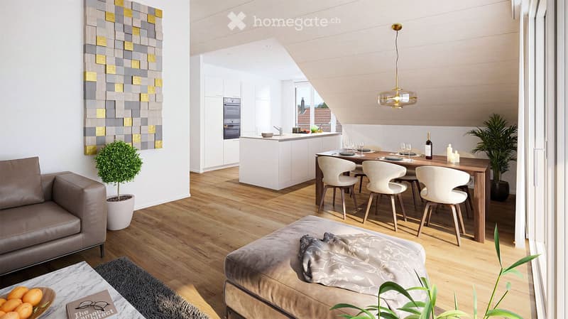 Modern open-plan living and dining area with a grey leather sofa, ottoman, coffee table, dining table with chairs, kitchen area with white cabinets and an oven, pendant light, and decorative plants.