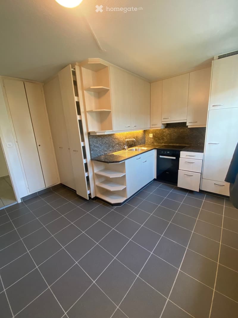 modern kitchen, white cabinets, tiled floor, sink, oven, dishwasher, washing machine