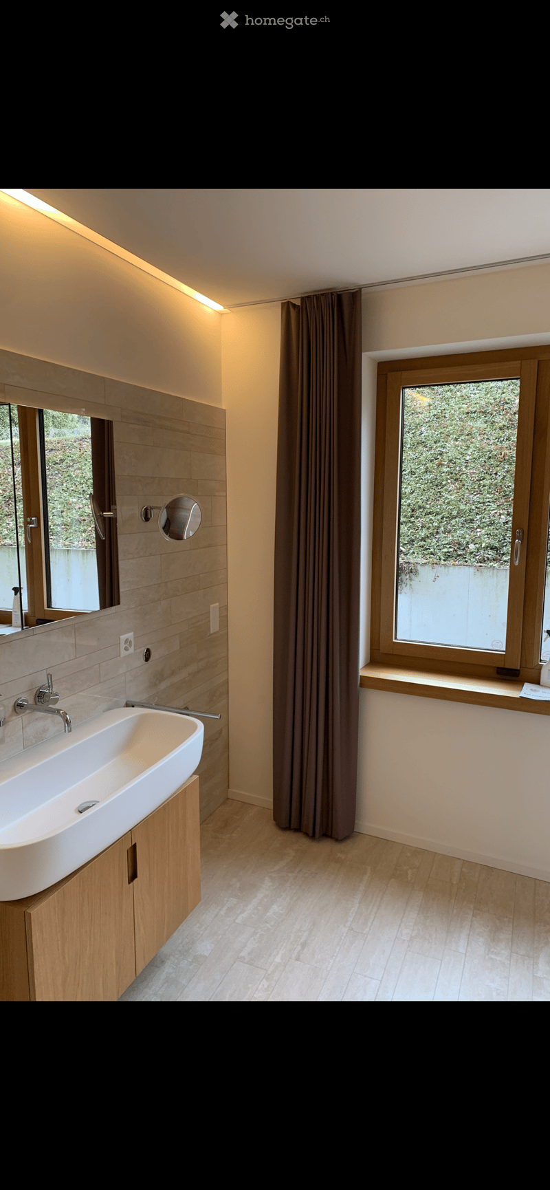 modern bathroom, white sink, wooden cabinet, mirror, window, curtain, tiled floor