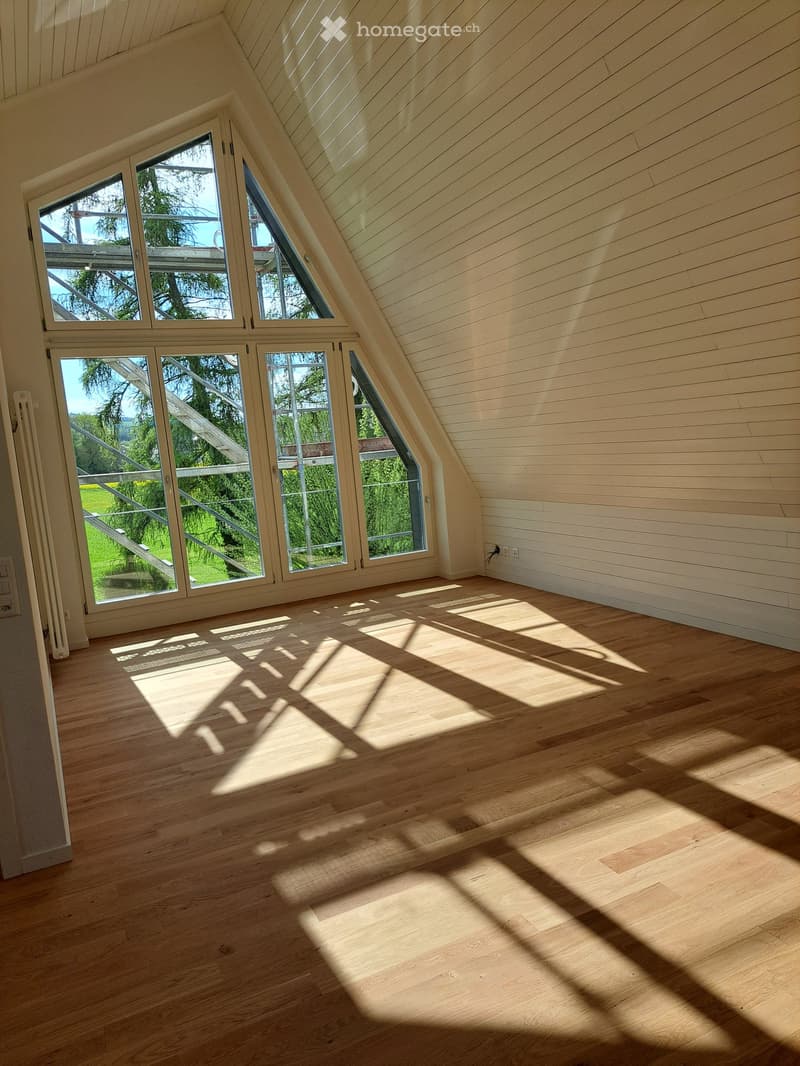 empty room, wooden floor, white walls, large windows, view of the outside