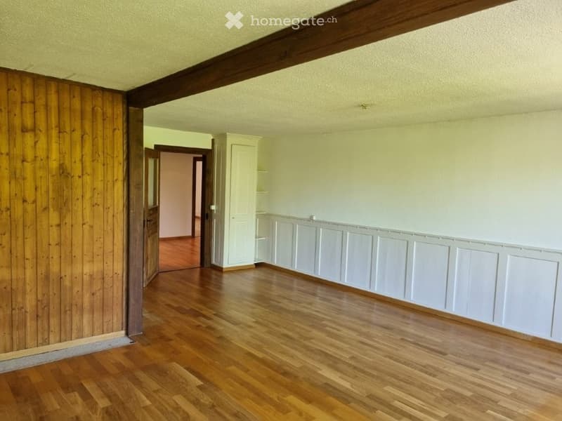 empty room, wooden floor, white walls, wooden paneling, open door