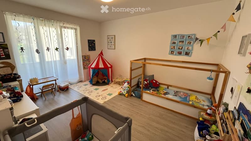 Children's room with toys, play tent, bunk bed, rug, toys, shelves, pictures, curtains