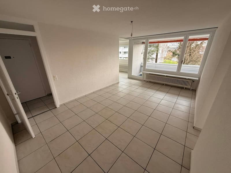 empty room, white walls, tiled floor, sliding glass door, balcony