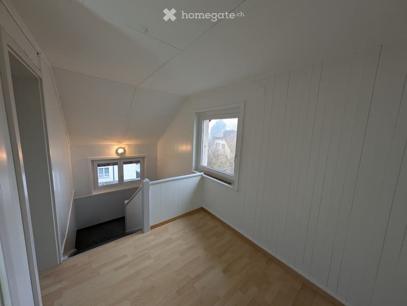 empty room, wooden floor, white walls, windows, light on the ceiling, staircase