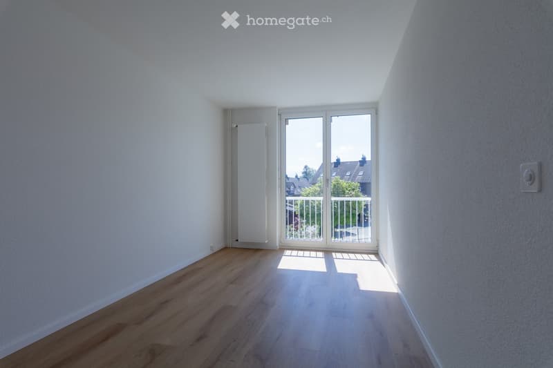 empty room, white walls, wooden floor, sliding glass door, balcony