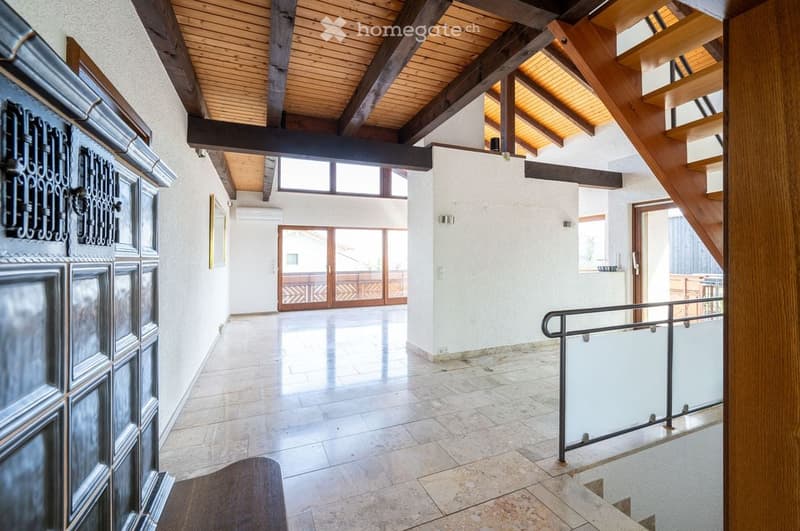 tiled floor, wooden beams, glass doors, staircase, white walls