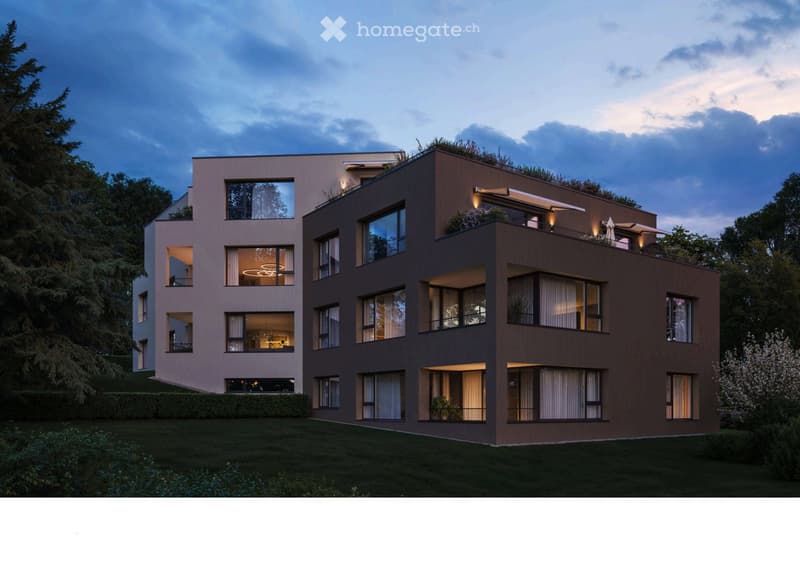 Modern two-story house with large windows, a flat roof, and a well-maintained lawn in front.