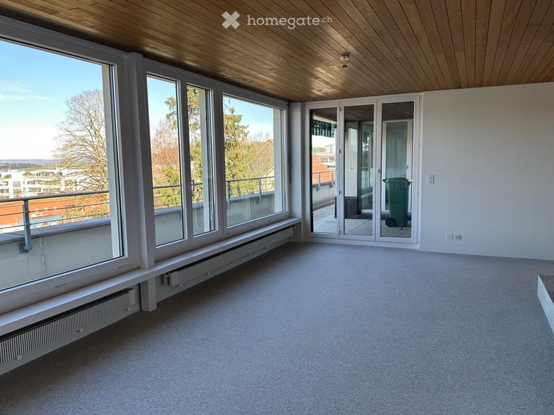large windows, balcony, wooden ceiling, radiators, sliding glass doors