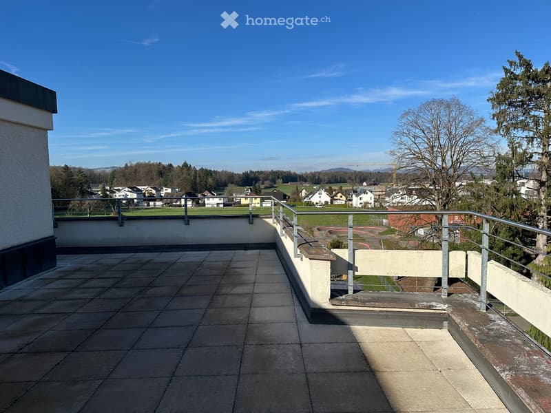 tiled floor, metal railing, view of the town