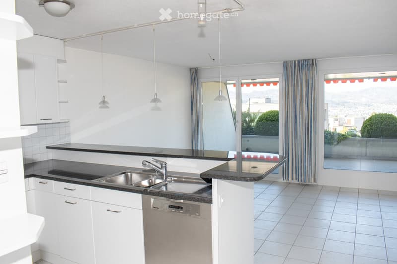 modern kitchen with white cabinets, black granite countertops, stainless steel sink, dishwasher, large windows, tiled floor