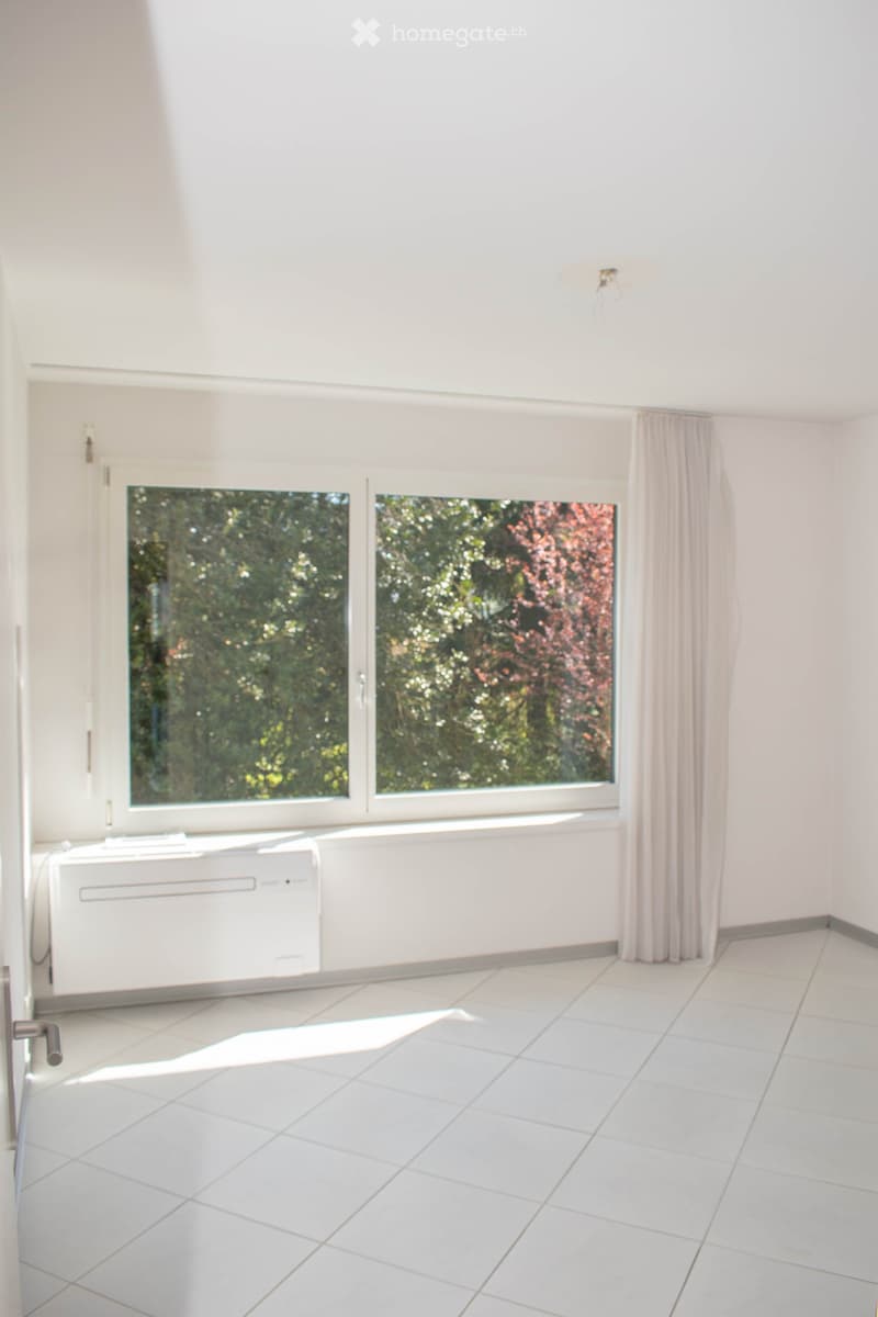 empty room, white tiles, large window, white curtains, white walls