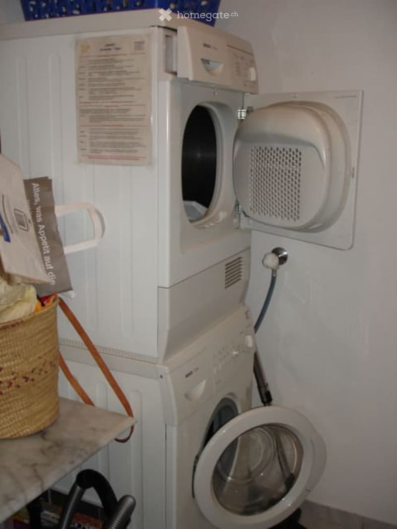 washer and dryer stacked on top of each other