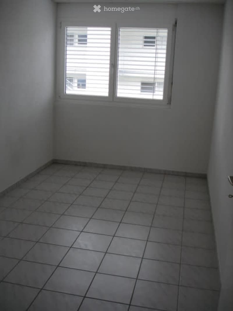 tiled floor, windows with blinds, white walls, empty room