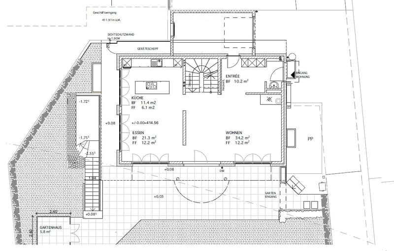 Floor plan of a residential space including entrance, living area, kitchen, dining area, and garden access.