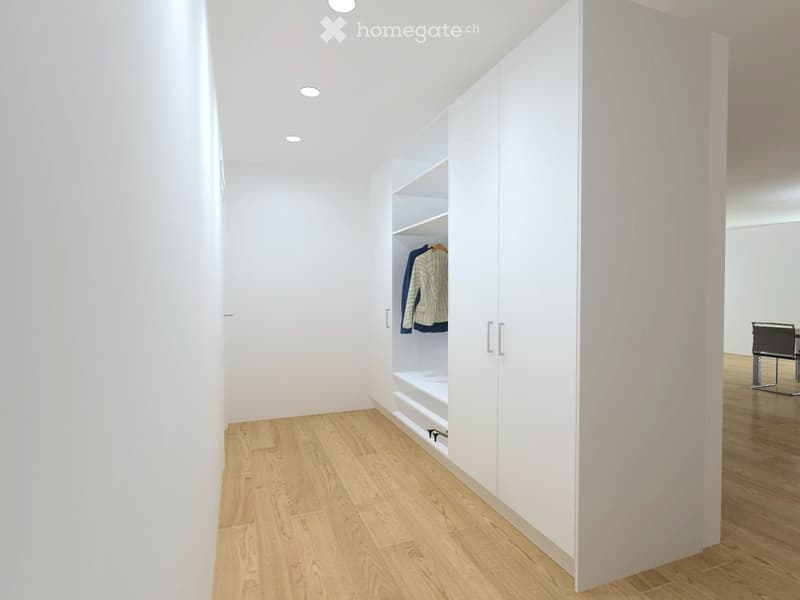 A modern, minimalist hallway with white walls, wooden flooring, built-in white closet with shelves, and a small seating area visible in the background.
