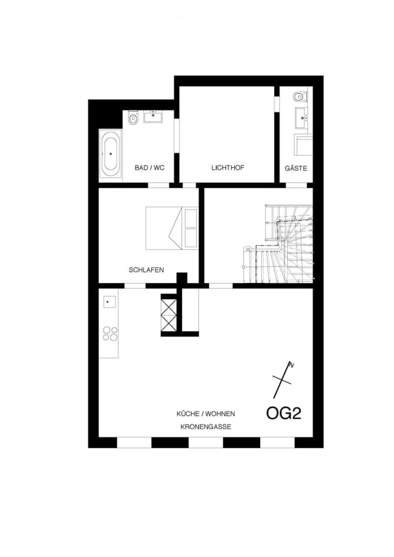 Floor plan showing a bathroom, living room, kitchen, guest room, and bedroom.