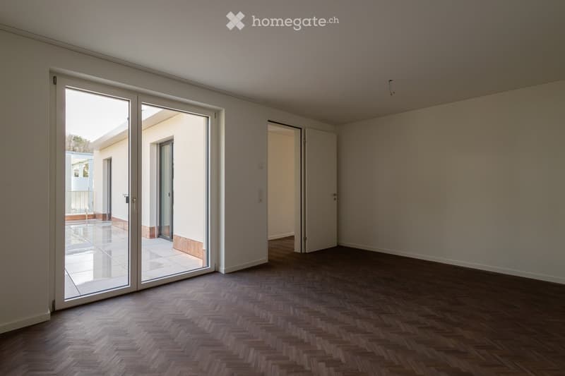 empty room, glass doors, tile floor, balcony access, white walls