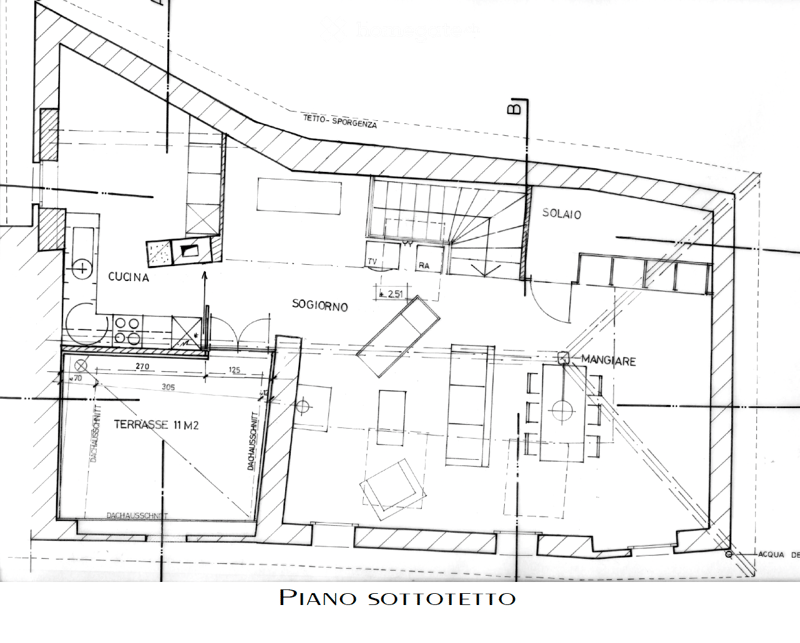 Floor Plan. Floor plan of a basement level showing a living room, kitchen, dining area, terrace, and bathroom.