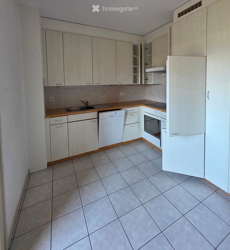 modern kitchen with white cabinets, tiled floor, sink, dishwasher, oven, refrigerator