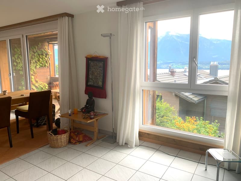 Other. {"visible_features": ["View"], "type": "Furnished Room", "objects": ["table", "chair", "stool", "floor lamp", "table runner", "table runner", "table runner", "table runner", "table runner", "table runner", "table runner", "table runner", "table run