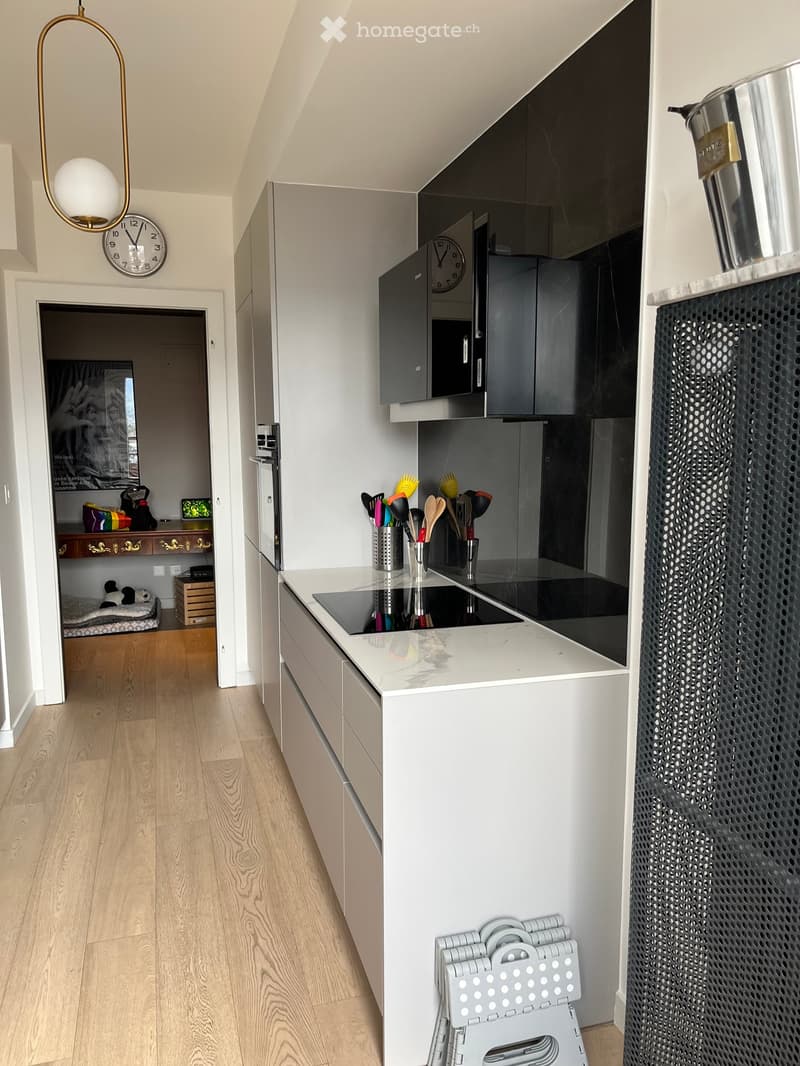 {"type": "Kitchen", "objects": ["refrigerator", "cabinets", "stove", "clock", "stool", "stool", "stool", "stool", "stool", "stool", "stool", "stool", "stool", "stool", "stool", "stool", "stool", "stool", "stool", "stool", "stool", "stool", "stool", "stool