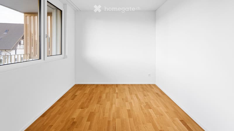 Unfurnished Room. Completely empty room with bare white walls and wooden floor. No furniture or equipment.