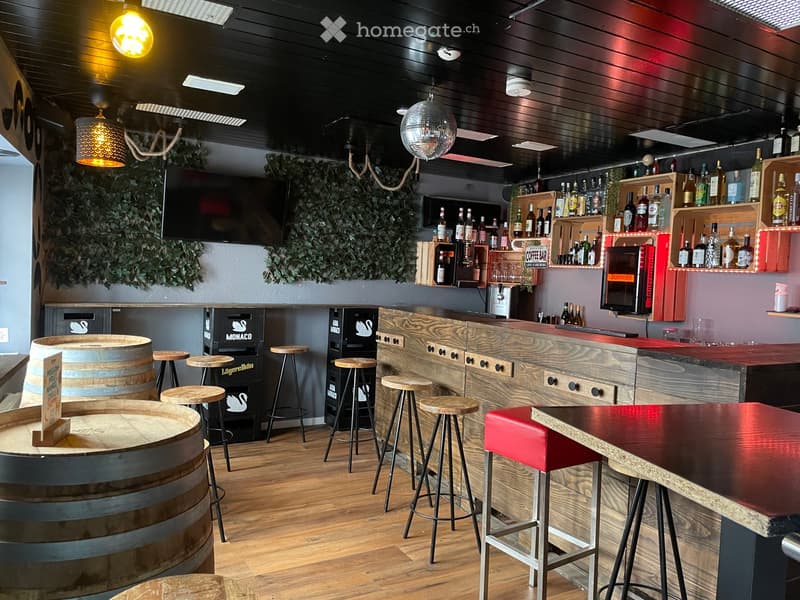 {"type": "Furnished Room", "objects": ["bar counter", "stool", "table", "bottle", "screen", "ball", "stool", "stool", "stool", "stool", "stool", "stool", "stool", "stool", "stool", "stool", "stool", "stool", "stool", "stool", "stool", "stool", "stool", "s