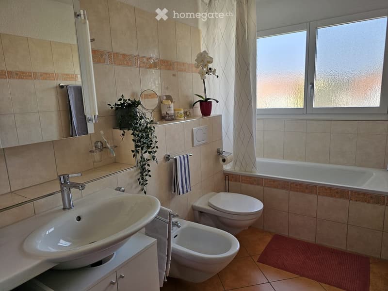 bathroom with sink, bidet, toilet, and bathtub
