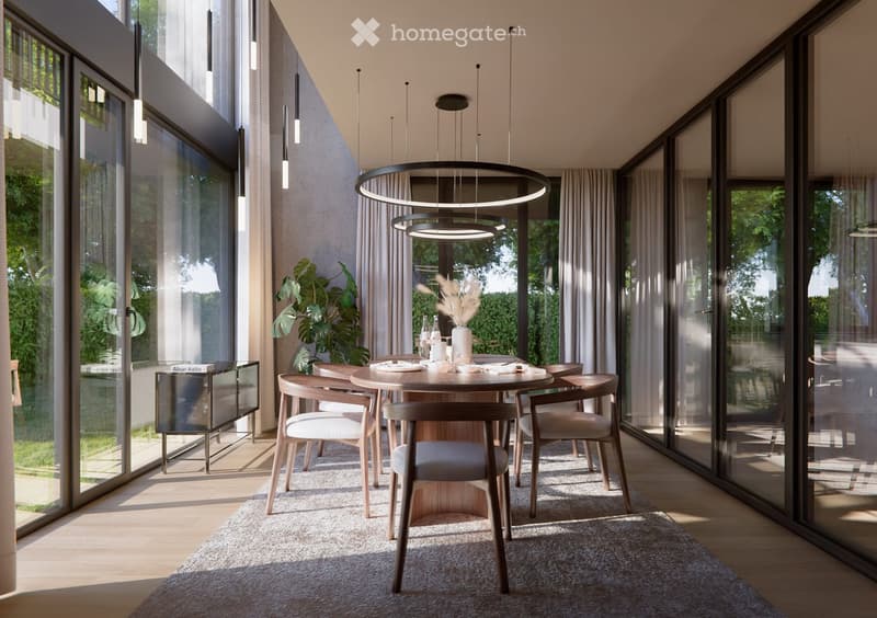 Modern dining room with large windows, a round wooden dining table surrounded by six chairs, a pendant light fixture, and a sideboard with a vase and decorative items.