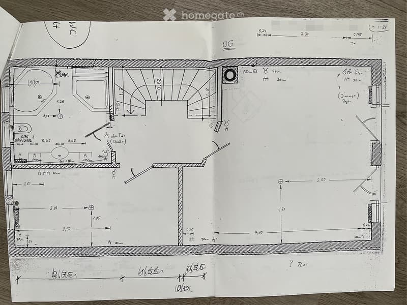Floor plan of a residential space showing a living area, kitchen, bedroom, and bathroom with labeled dimensions and room labels.