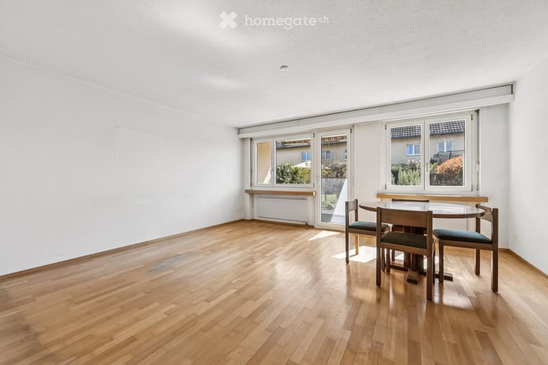 empty room, wooden floor, white walls, large windows, balcony, table and chairs