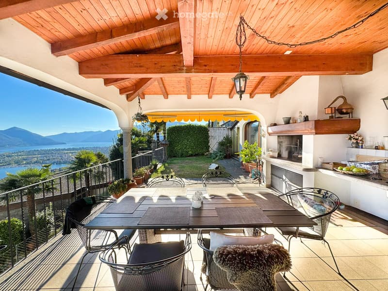 Wooden beams, table and chairs, garden view, mountain view, sea view