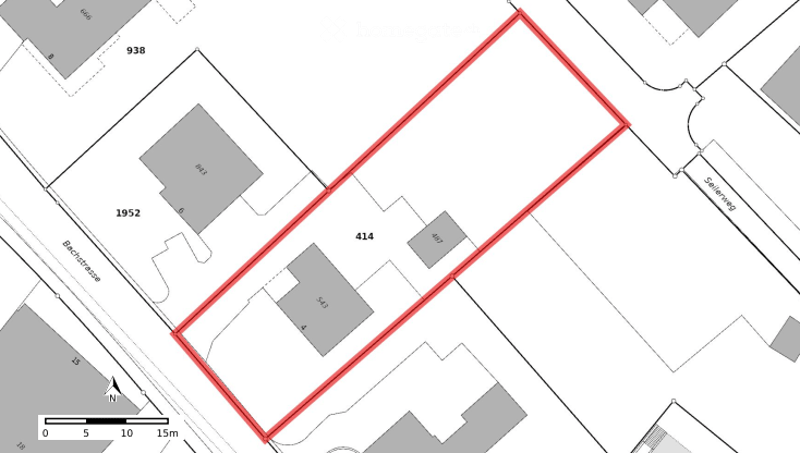 Floor Plan. Floor plan showing a rectangular plot of land outlined in red, surrounded by neighboring plots and streets.