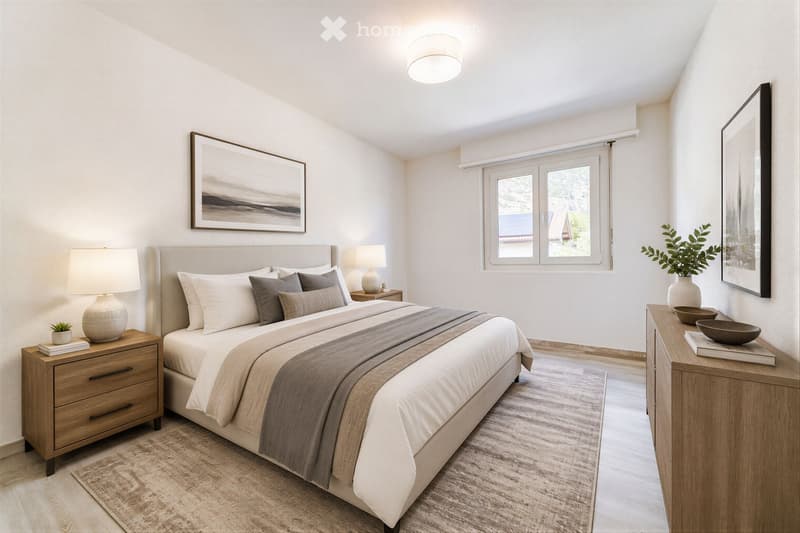 Modern bedroom with a large bed, nightstands, lamps, a mirror, and a plant. The room features a large window with blinds and a view of the outdoors.