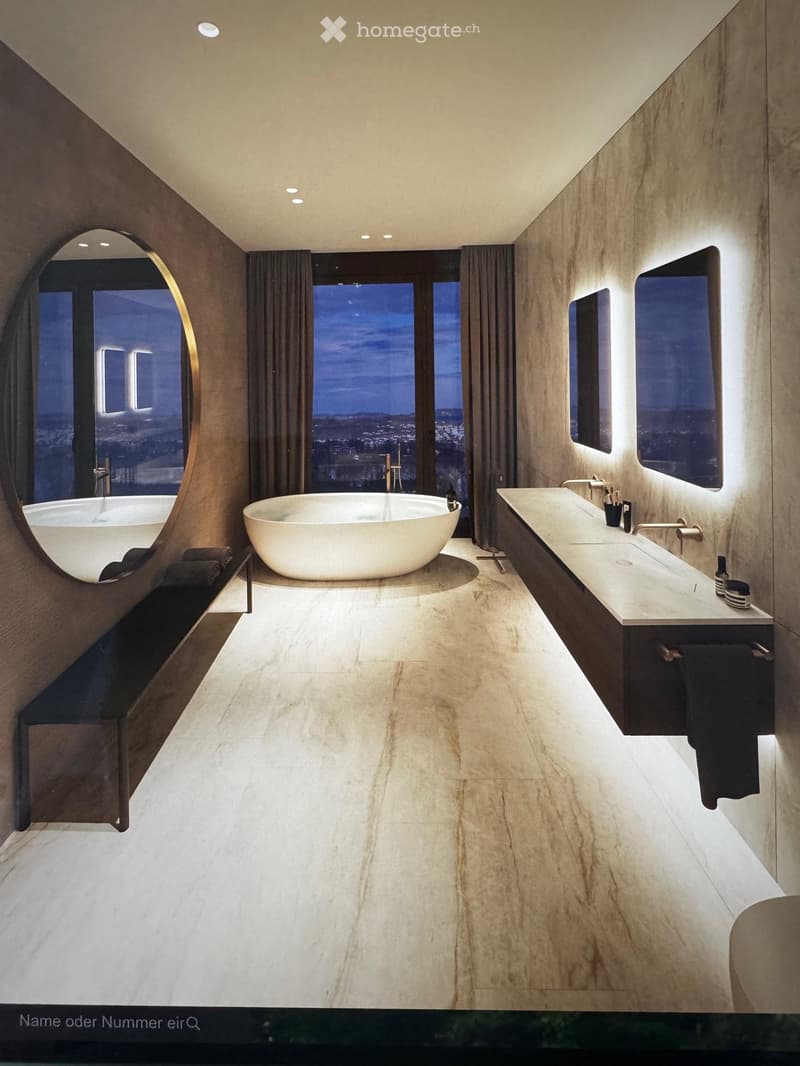 Modern bathroom with two freestanding bathtubs, a double sink vanity, large mirrors, and a view of the cityscape through large windows.