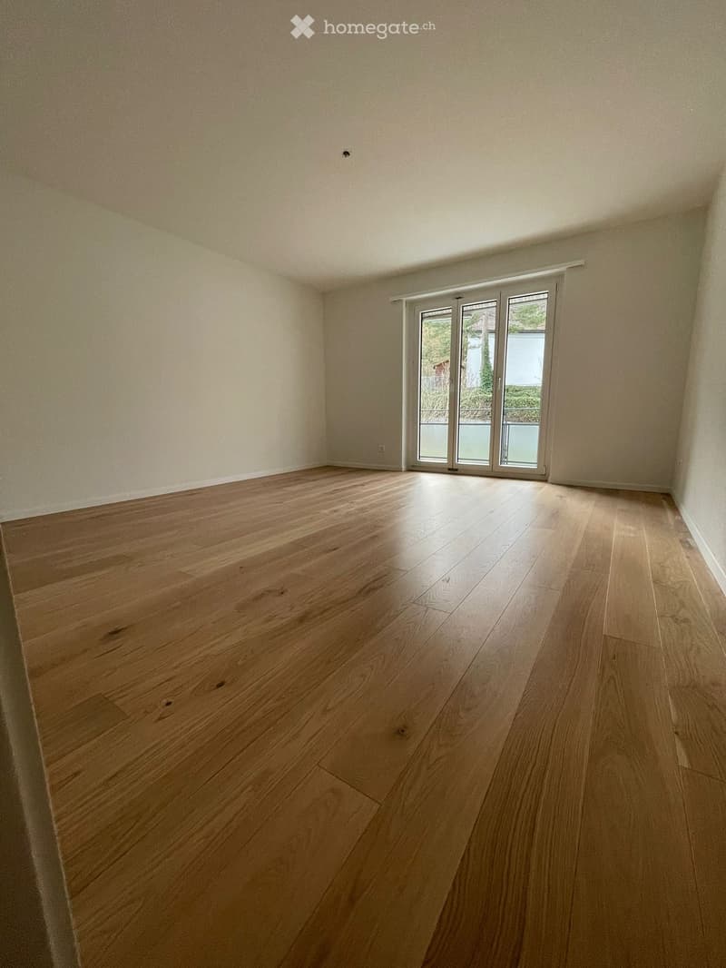 empty room, hardwood floors, sliding glass doors, balcony