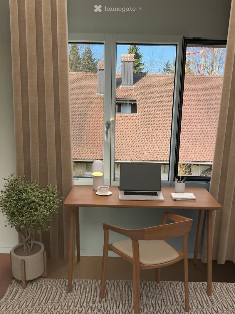Furnished Room. A modern, well-lit room with a wooden desk, laptop, chair, cup, lamp, book, and potted plant near a large window with a view of rooftops.