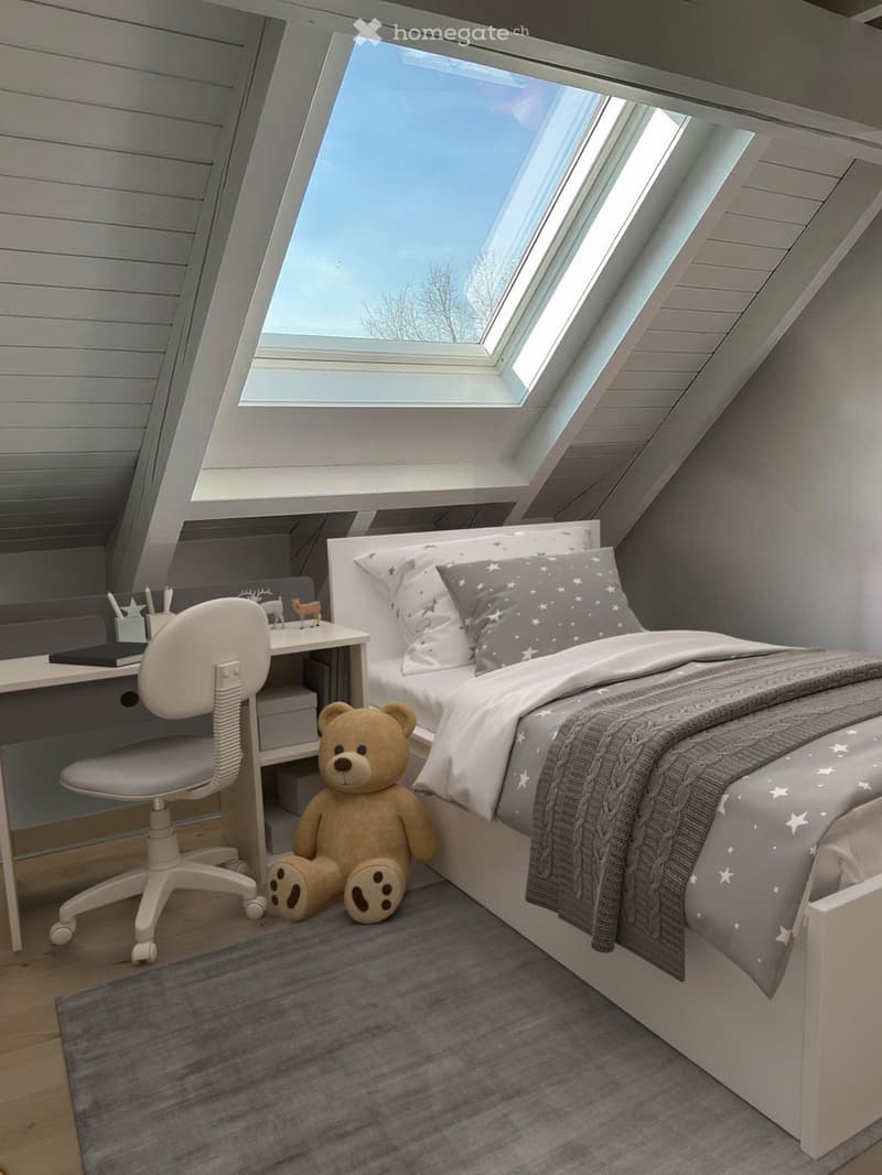 Bedroom. Cozy attic bedroom with a single bed, desk, chair, and teddy bear. Features skylight windows and a grey rug.