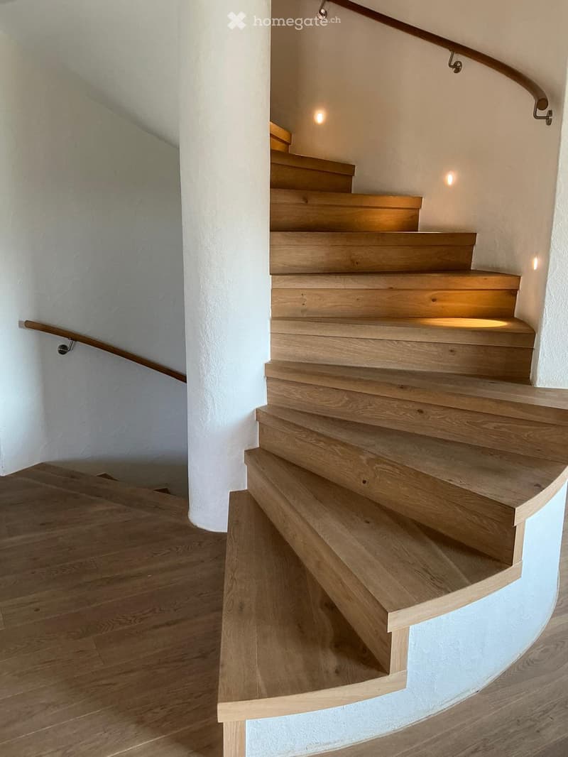wooden staircase, white walls, wooden handrail, wooden steps